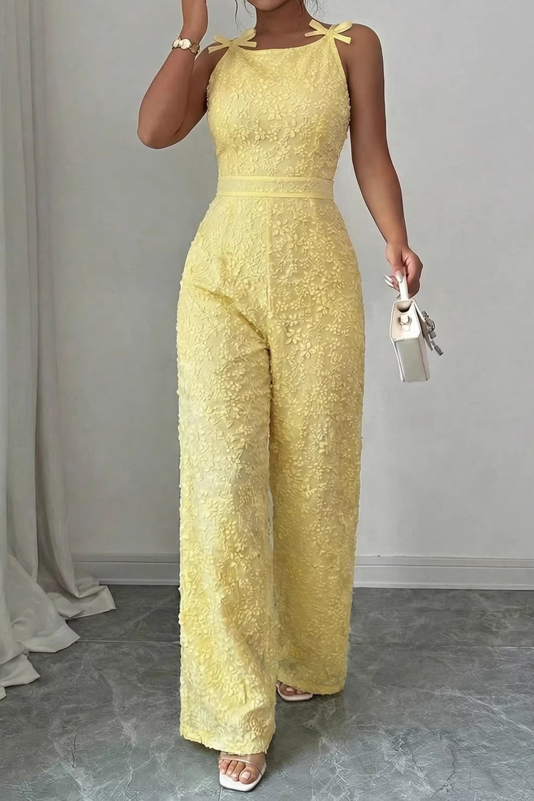 Foral Textured Round Neck Bow Sleeveless Jumpsuit