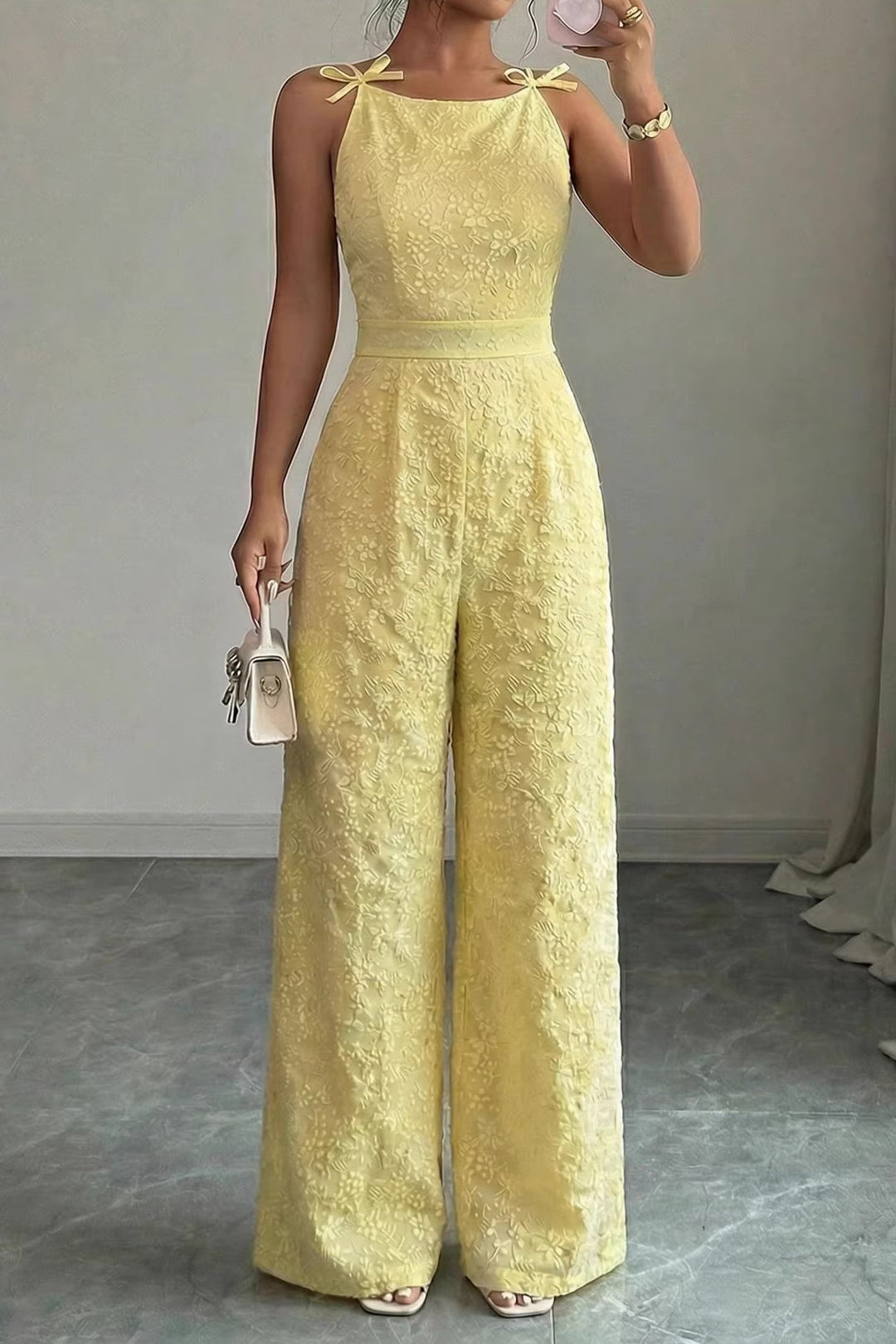 Foral Textured Round Neck Bow Sleeveless Jumpsuit